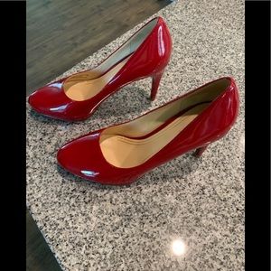 Cole Haan patent red almond toe pumps